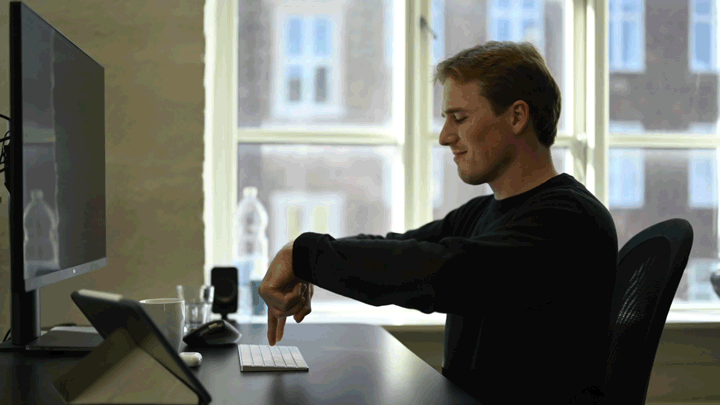 Software developer typing on a keyboard